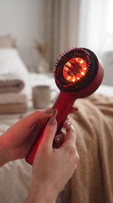 Activation de la brosse HairRevive avec son bouton principal